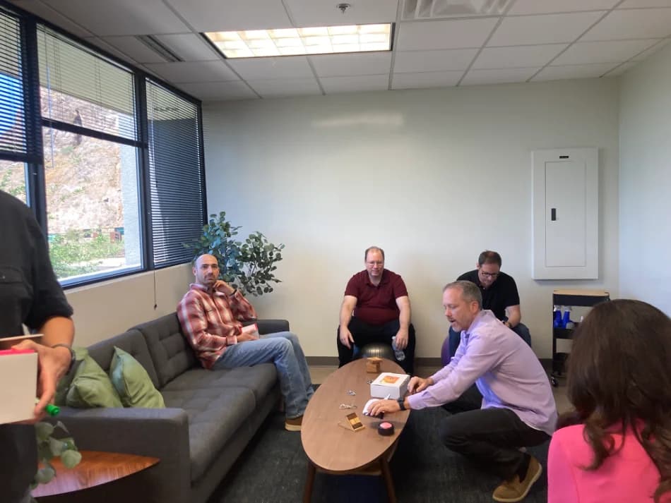 TheRecordXchange team members collaborating.